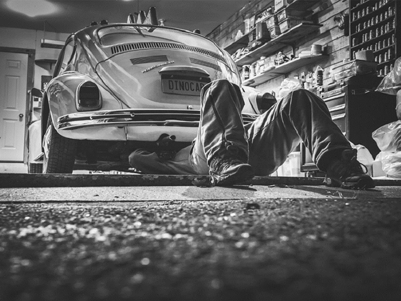 A man repairing a car